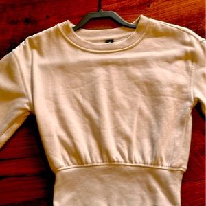 Cute cream long sleeve cropped top